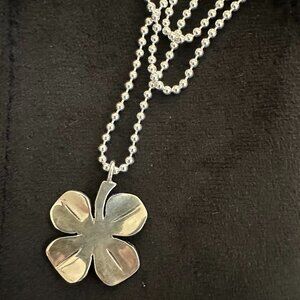 Sterling silver lucky four leaf clover pendant made from US silver quarter
